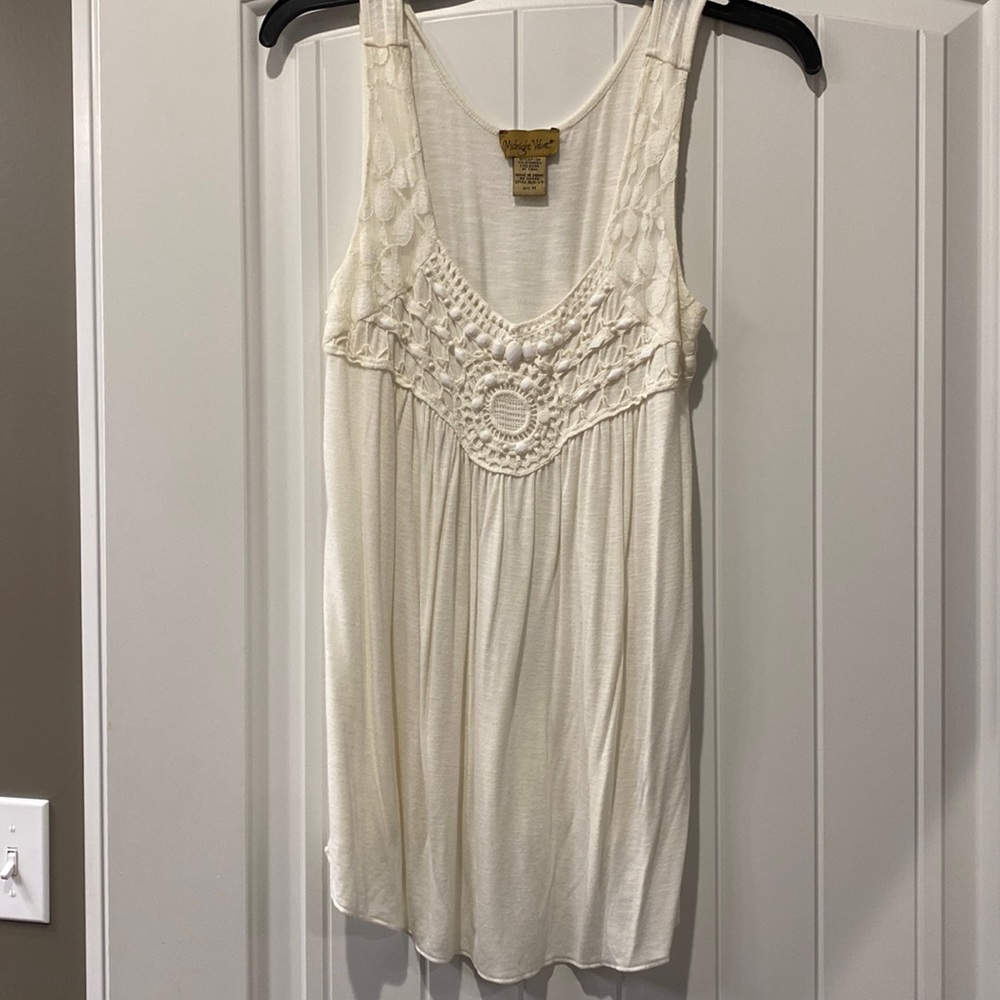 Embellished tank